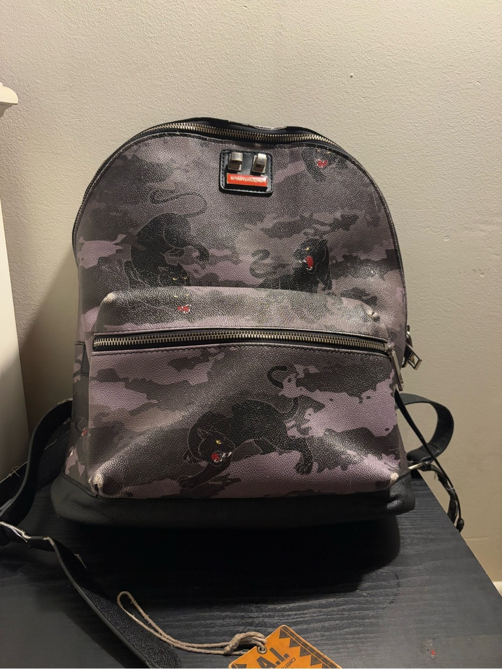 Sprayground Black and Purple Panther Print Backpack